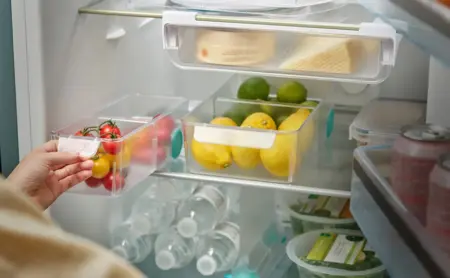Fridge organised with Joseph Joseph FridgeStore™ rotating shelf and under-shelf drawer
