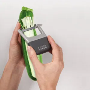 Julienne vegetable peeler with stainless-steel blade and grey grip by Joseph Joseph